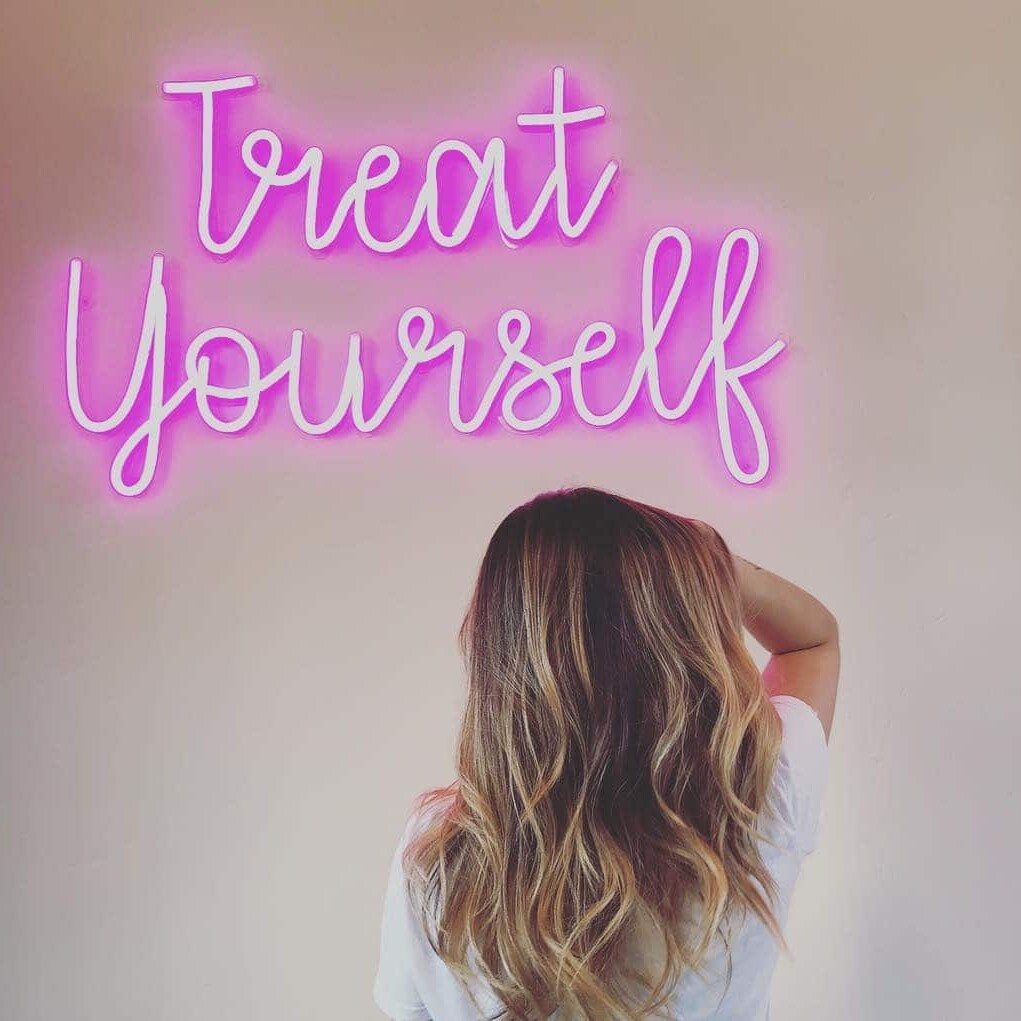 Treat Yourself neon sign