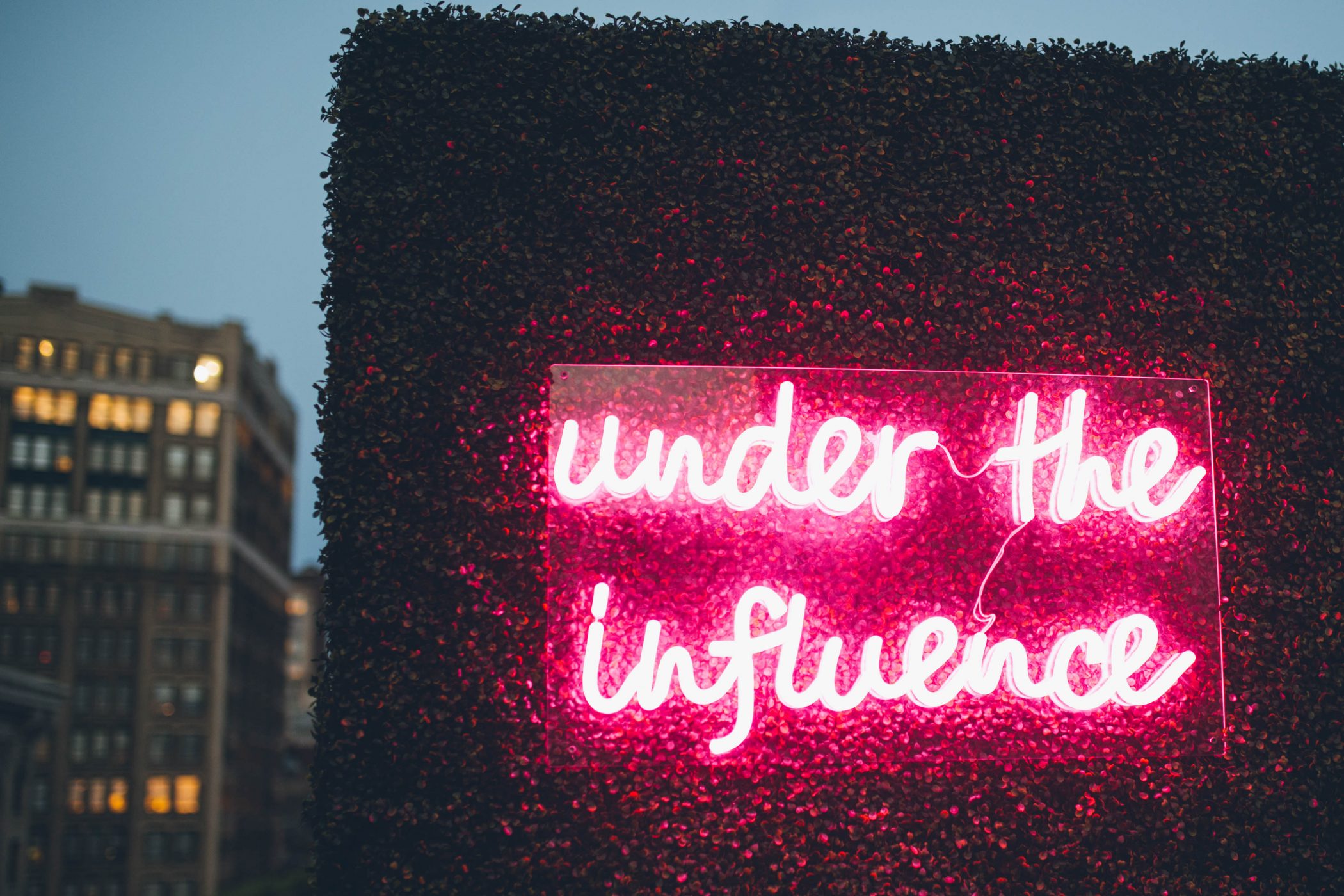 under the influence neon sign