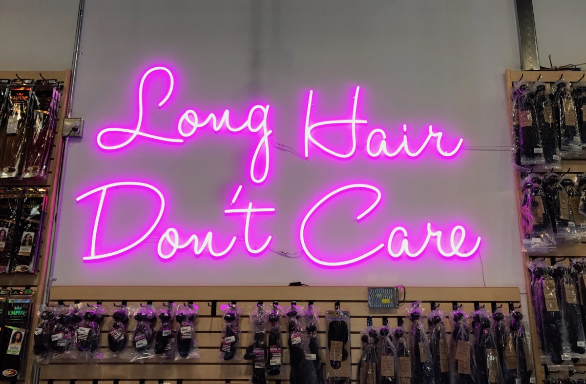 long hair don't care neon sign