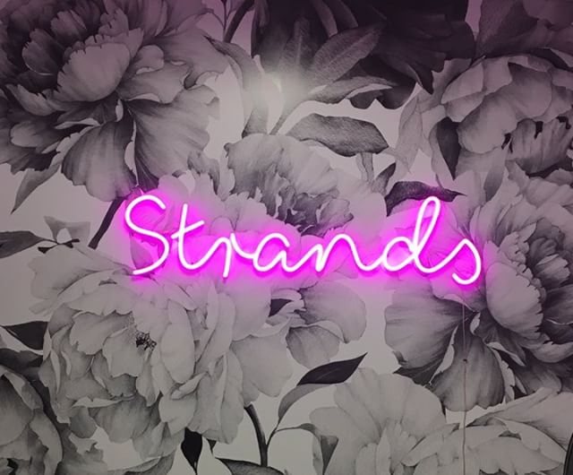 Strands neon sign