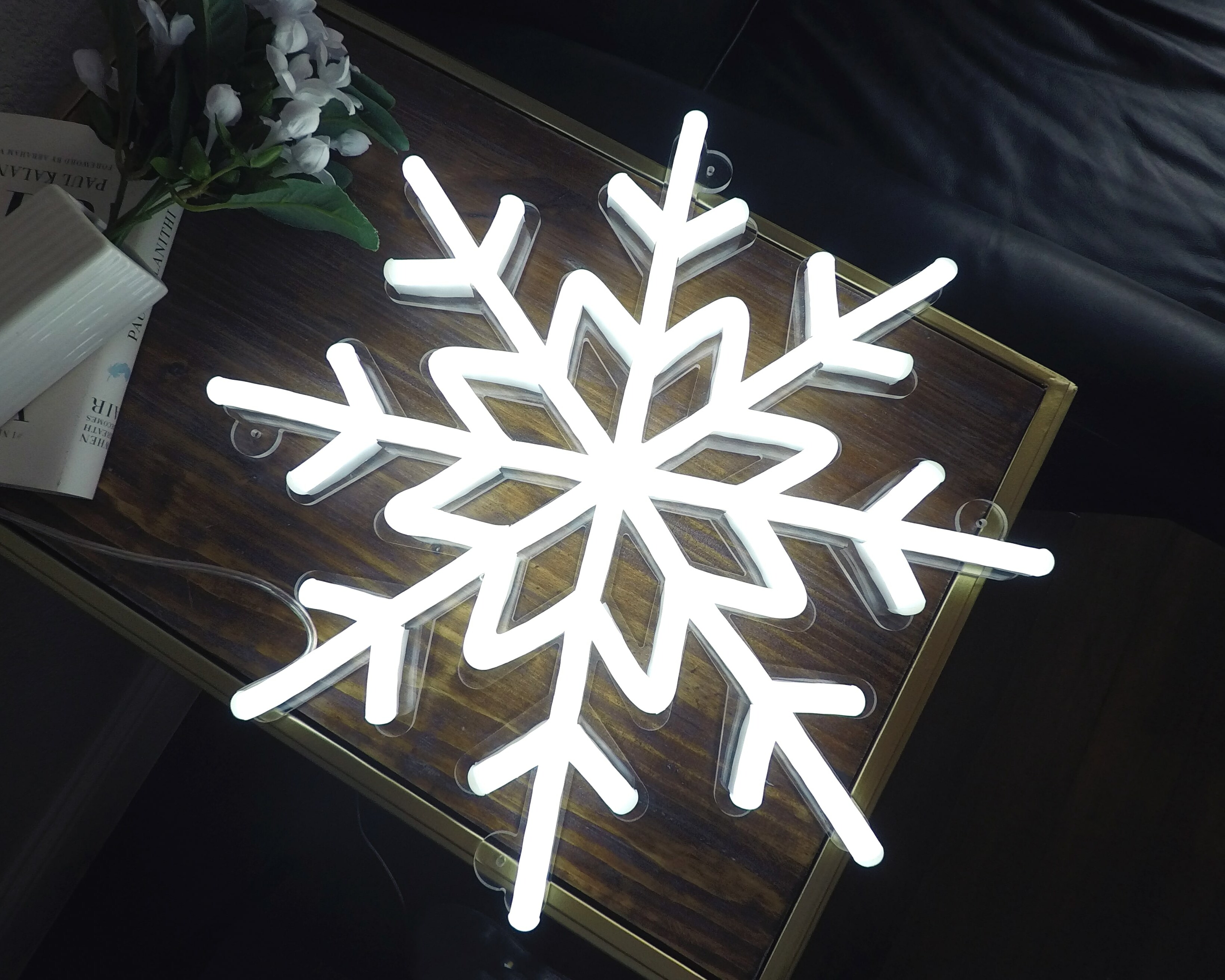 Snow-themed neon sign for a winter wonderland vibe