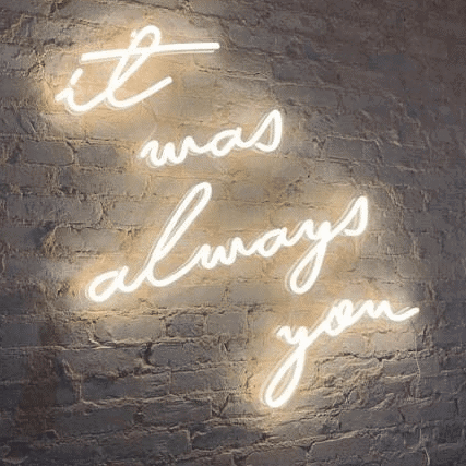 A colorful statement 'it was always you' used as a wall decor