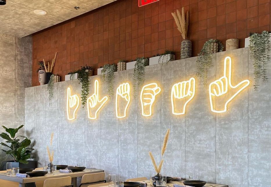 hand sign neon sign