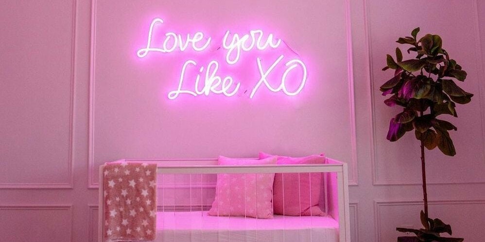 LED Light Signs of a phrase with pink background