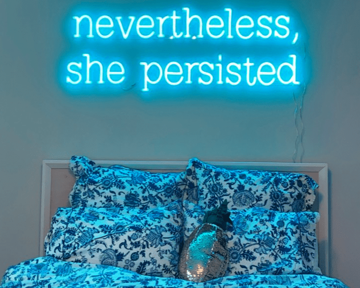 custom neon sign over bed