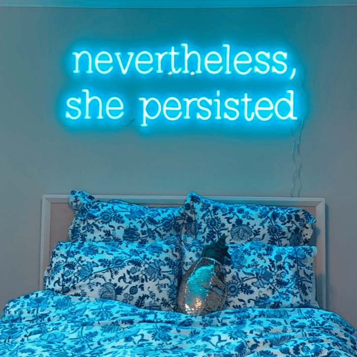 custom neon sign over bed