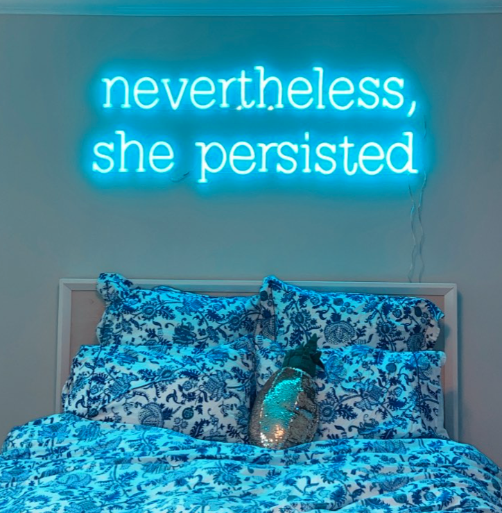 custom neon sign over bed