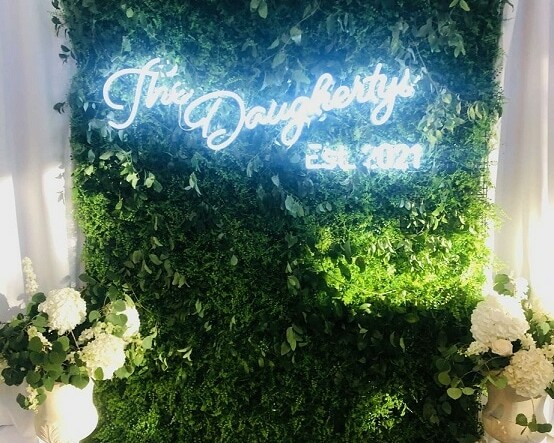 green wall wedding neon sign