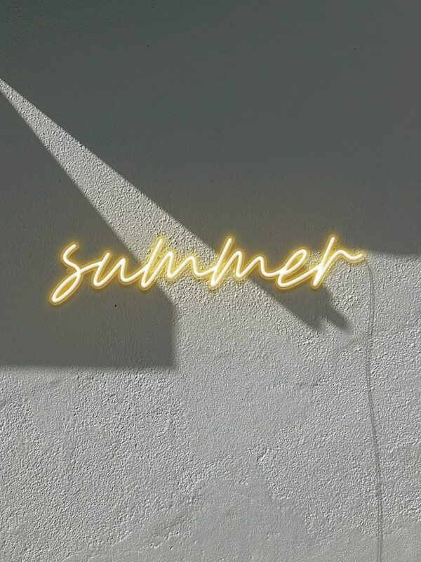 A minimalist neon sign of sunlight in the day