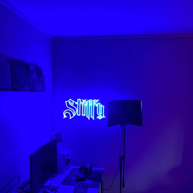 blue neon sign for game room