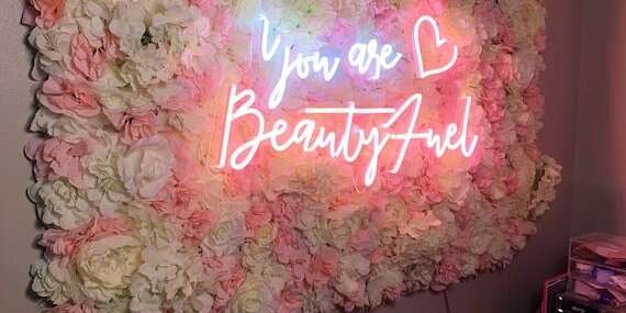 flower wall neon signs, pink custom neon sign on grass wall