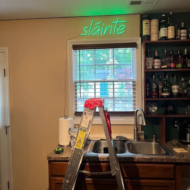 green neon sign for home