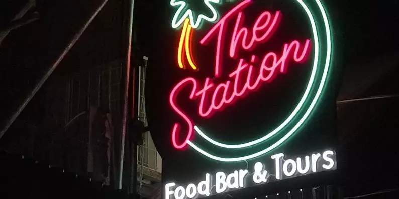 outdoor business neon sign, black backing neon light