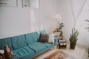 apartment living room old sofa Cylindrical lamp