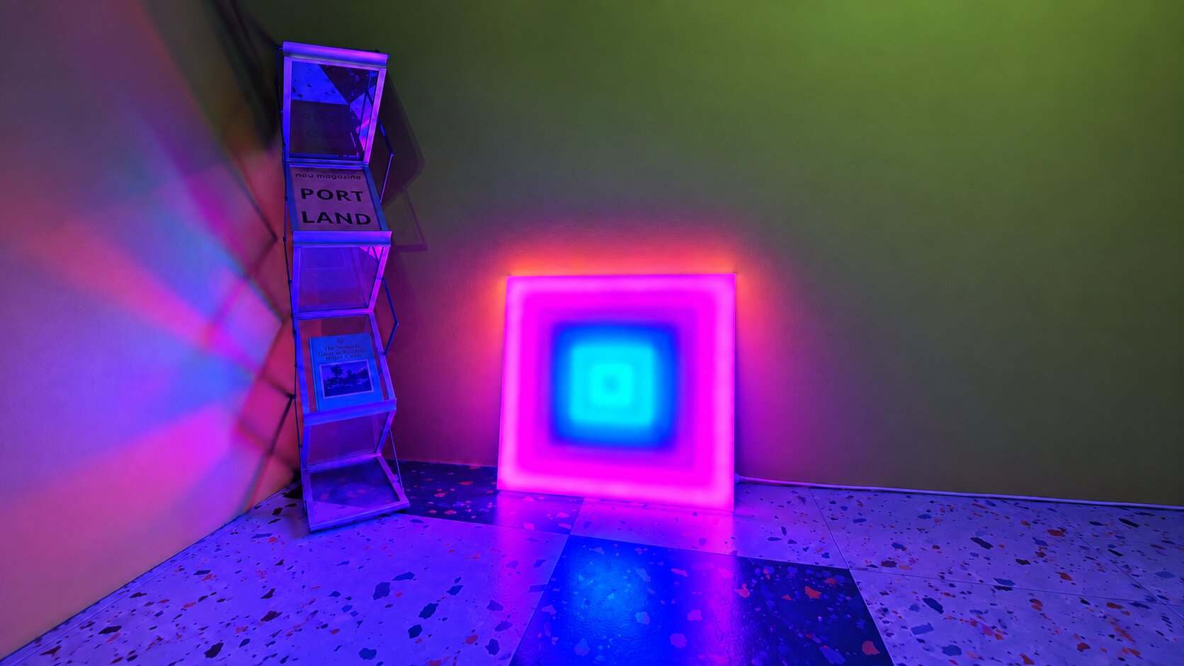 colorful reve lamp placed on the floor