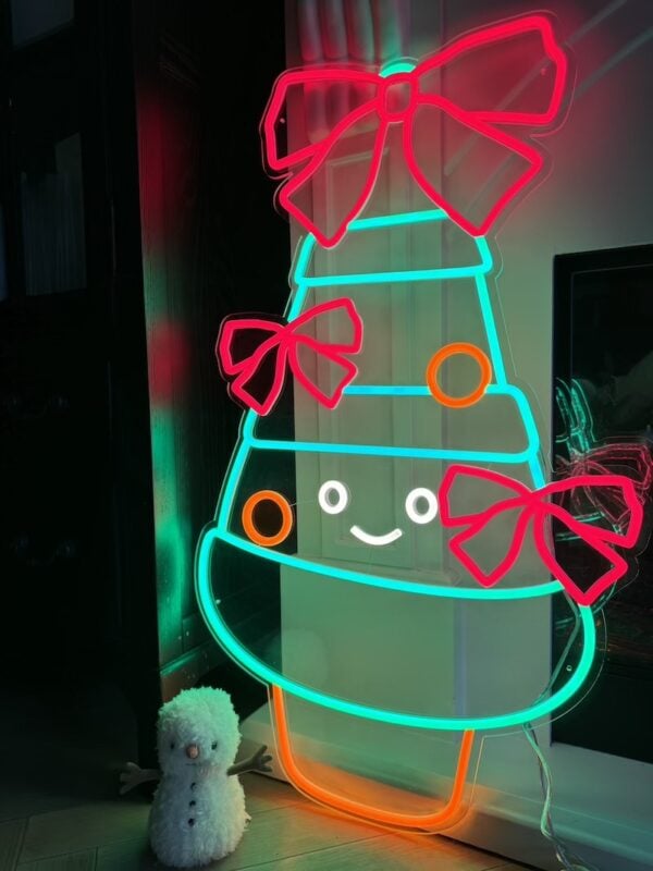 Decorated Christmas Tree Neon Light by fireplace