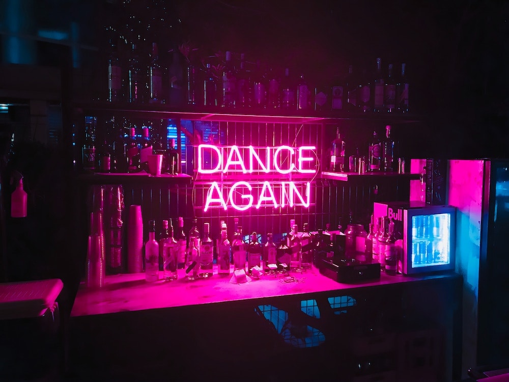 dance again pink bar glass neon sign