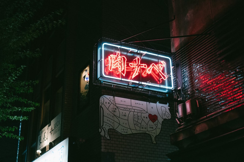 japanese bbq restaurant red and white outdoor glass neon
