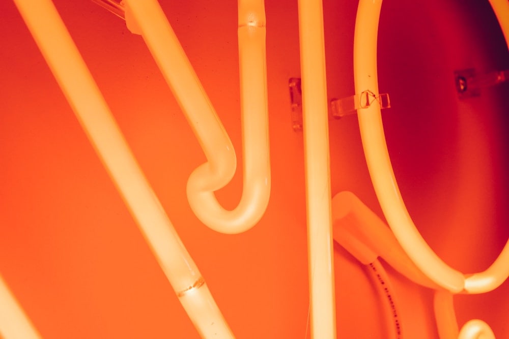 orange glass neon sign mounting details