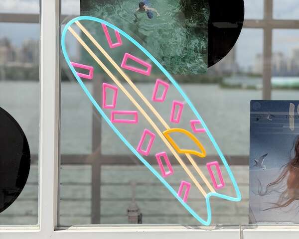 surf board neon sign beach vibe