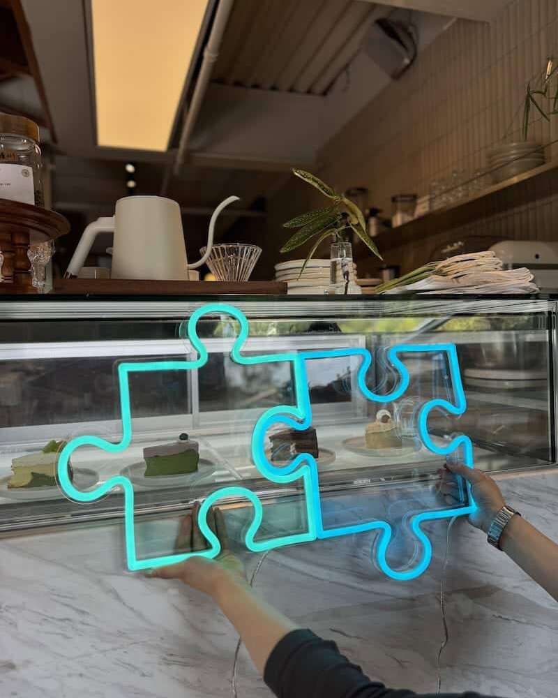jigsaw cafe decor blue neon sign