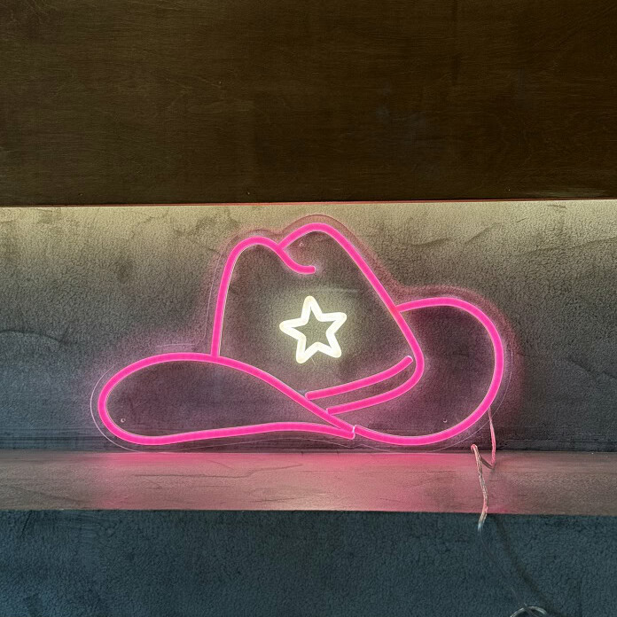 pink cowgirl hat neon sign