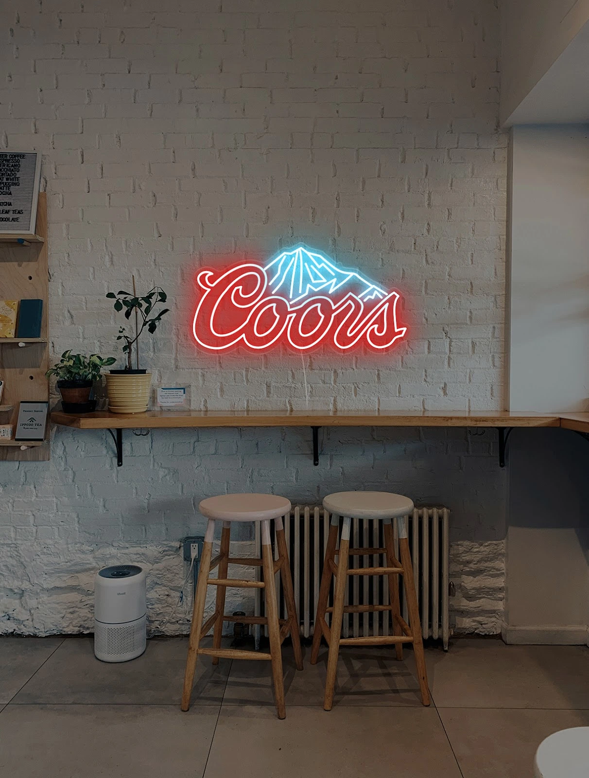 coors snowy mountain red and ice blue neon sign