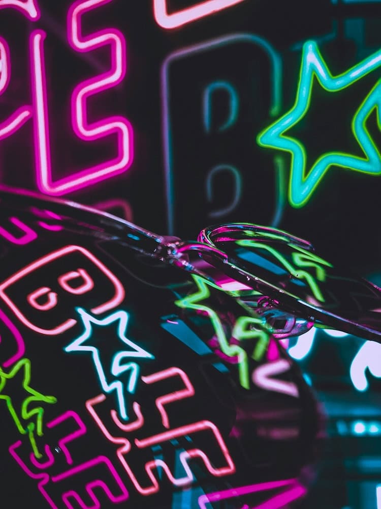 colorful neon sign pink and green