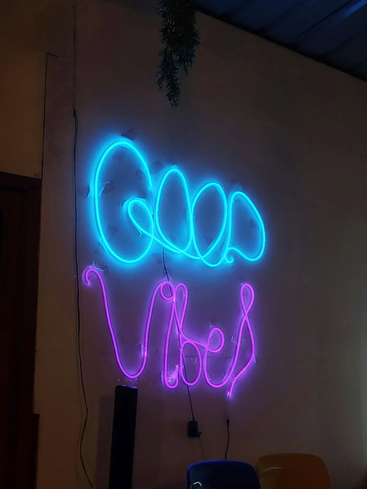 good vibes blue and purple neon sign
