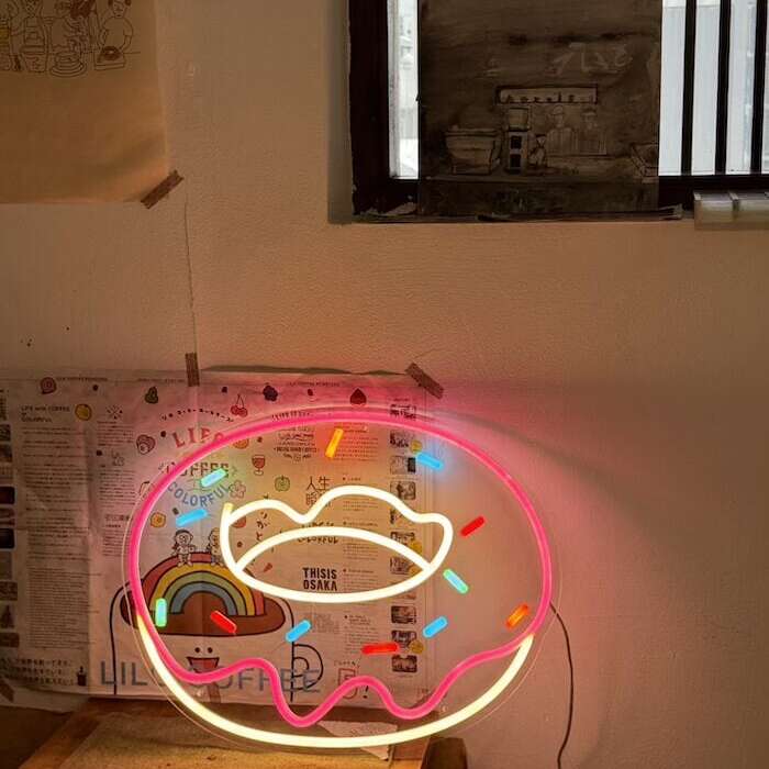 pink donut neon sign light cafe decor