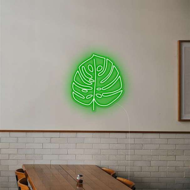 Monstera neon light restaurant decor