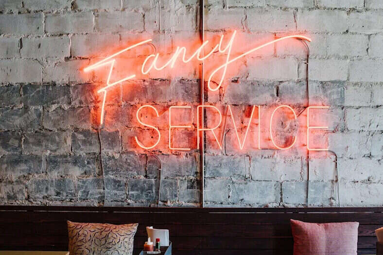 bon ton atlanta restaurant glass neon sign wall decor