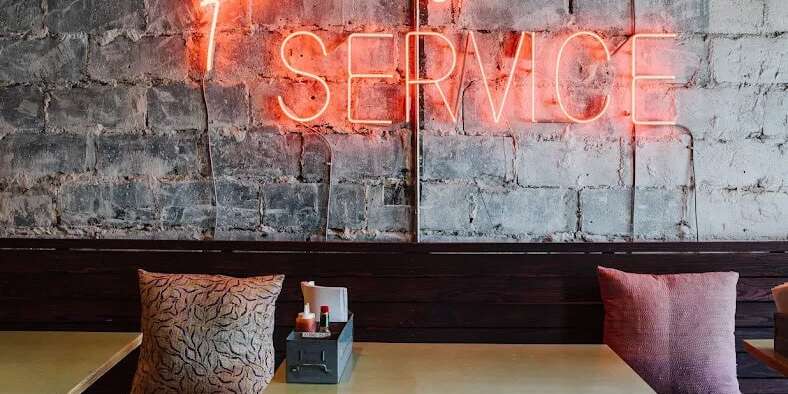 bon ton atlanta restaurant glass neon sign wall decor