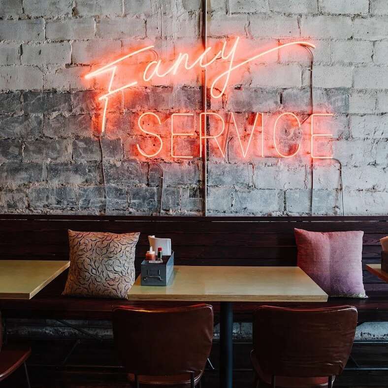 bon ton atlanta restaurant glass neon sign wall decor