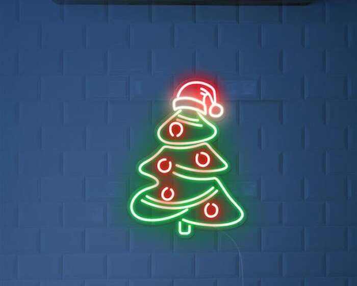 Christmas tree with Santa hat neon sign christmas vibe