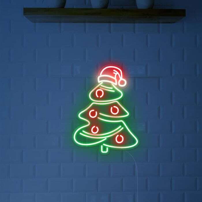 Christmas tree with Santa hat neon sign christmas vibe