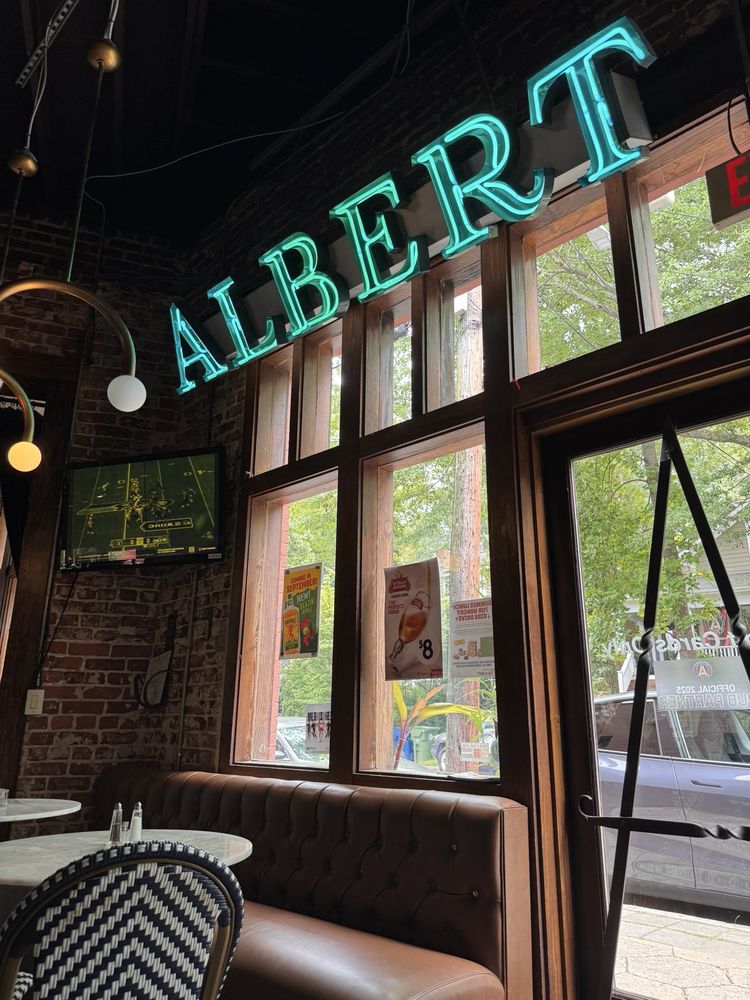 Albert glass neon sign in teal color