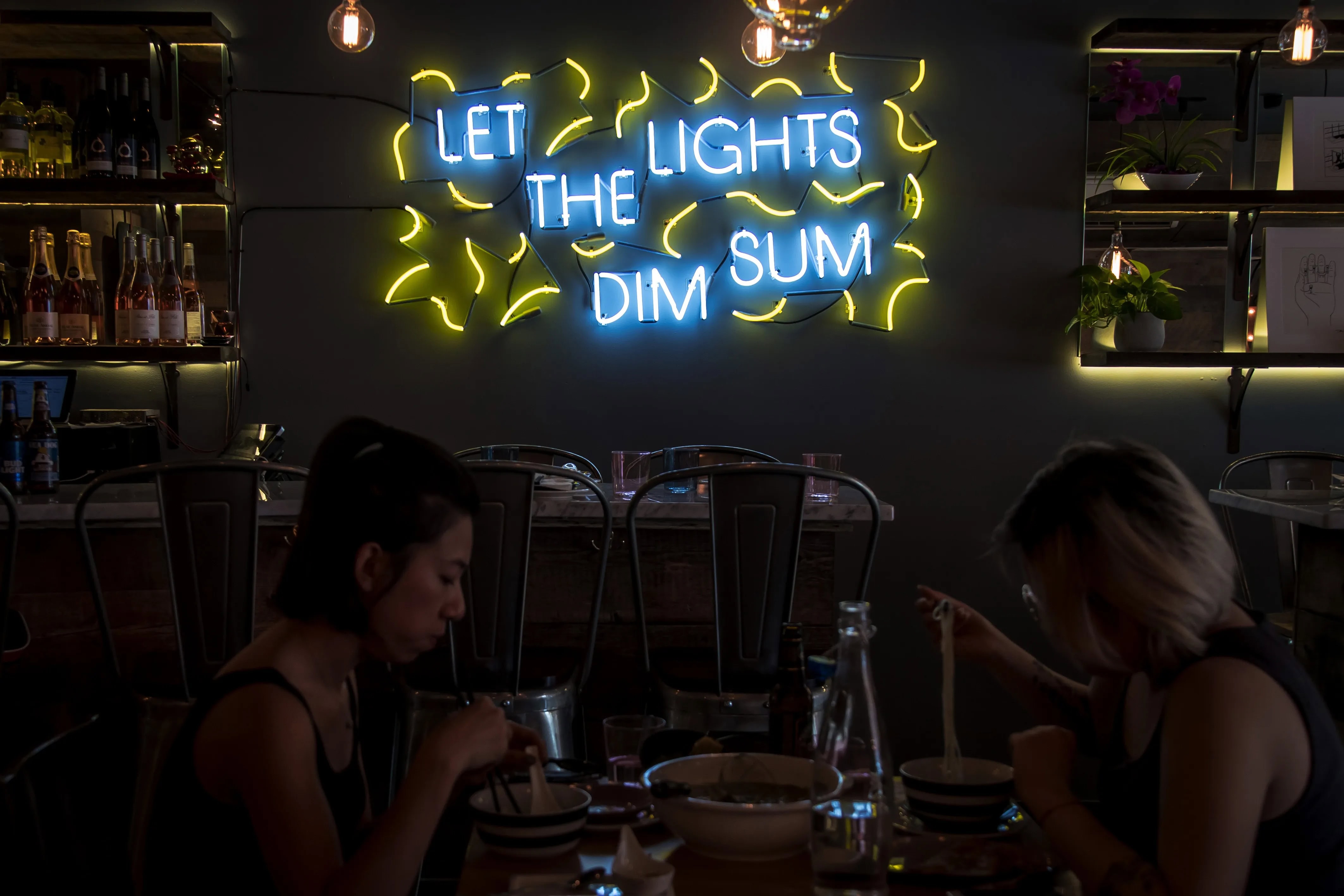 Carma East let the lights dim sum custum neon sign
