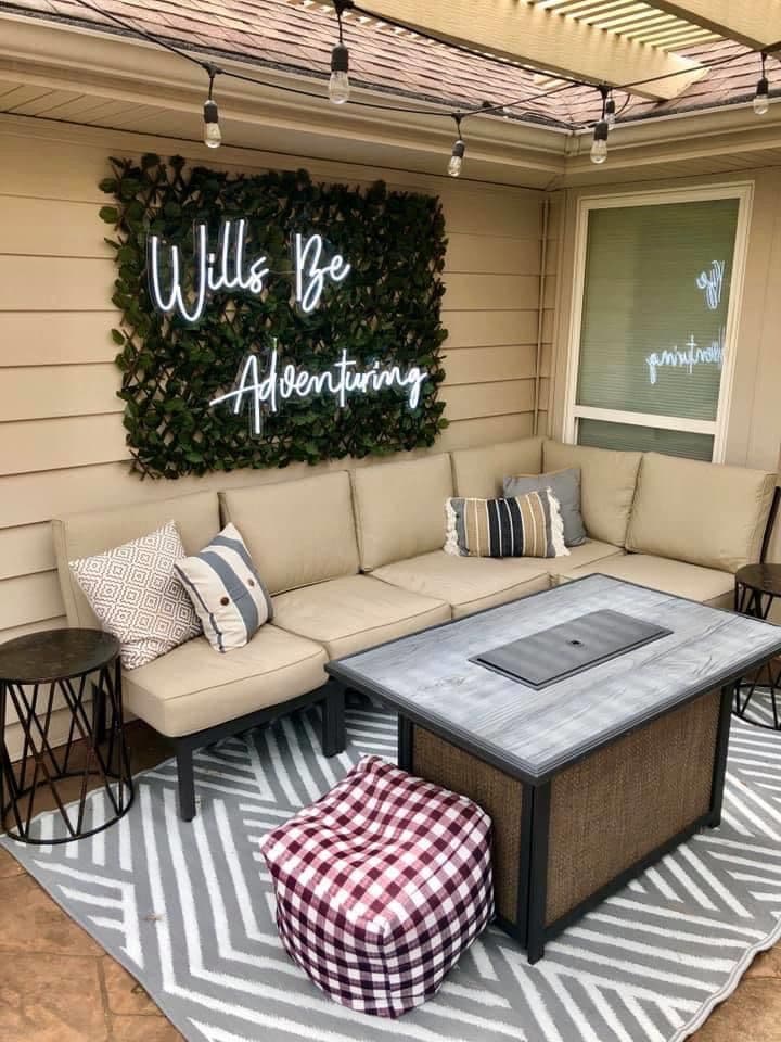 patio neon sign on faux green wall