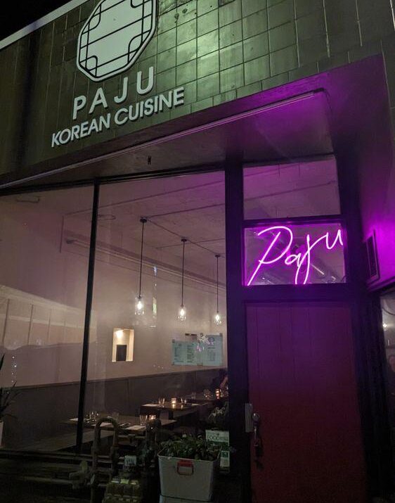 purple neon sign in korean restaurant