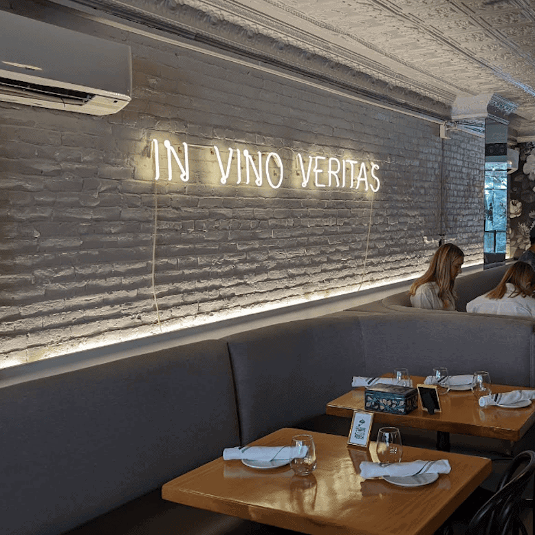 Frenchie Wine Bistro restaurant neon sign in Boston