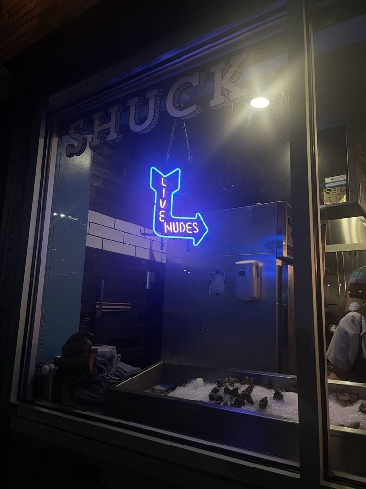 LIVE NUDES at Fish N Beer bar neon sign