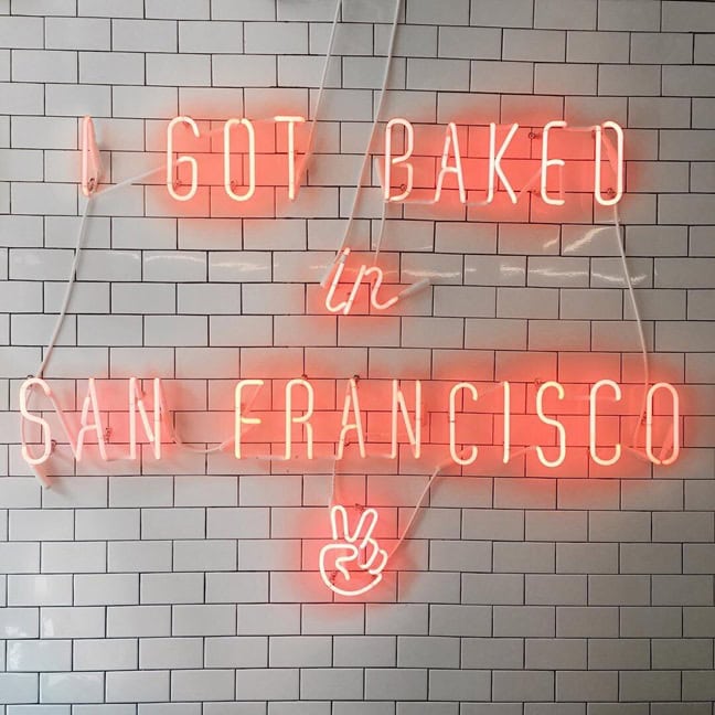 classic vintage glass neon sign directly mount on the wall in bakery store