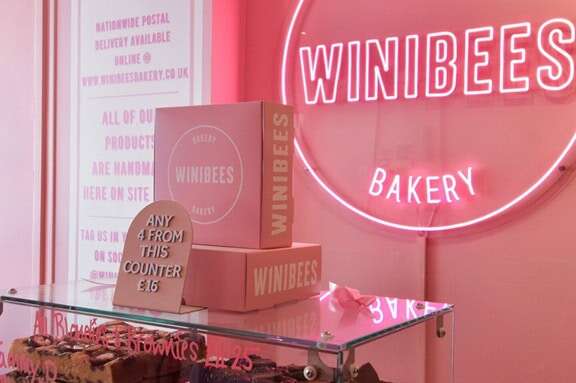 pink logo led neon sign for bakery modern interior