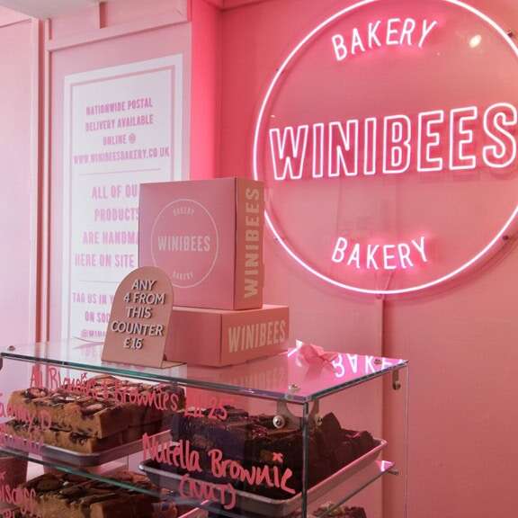pink logo led neon sign for bakery modern interior