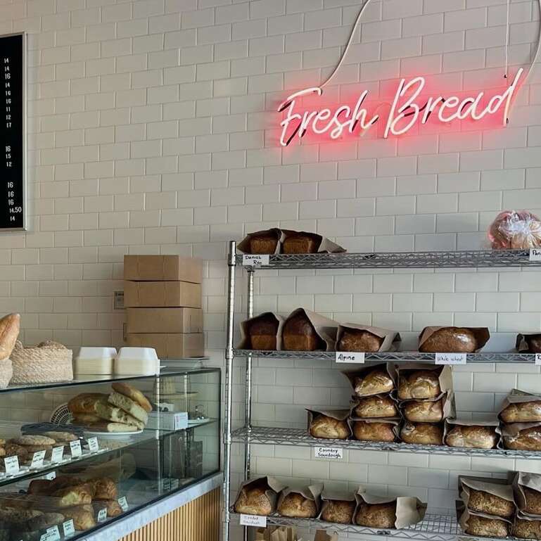 small glass neon sign for bakery store great for welcoming vibe