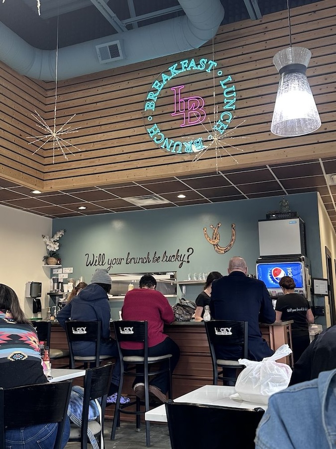 circular light blue and pink LED neon sign in licky brunch in detroit