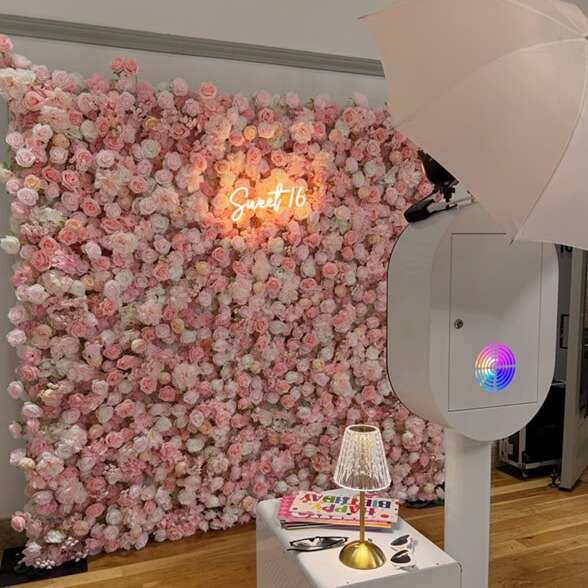 custom neon sign for photography studio with flower wall