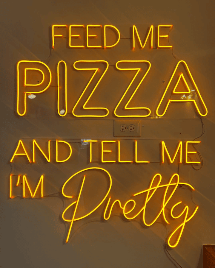 feed me pizza and tell me I'm pretty neon sign in Washington