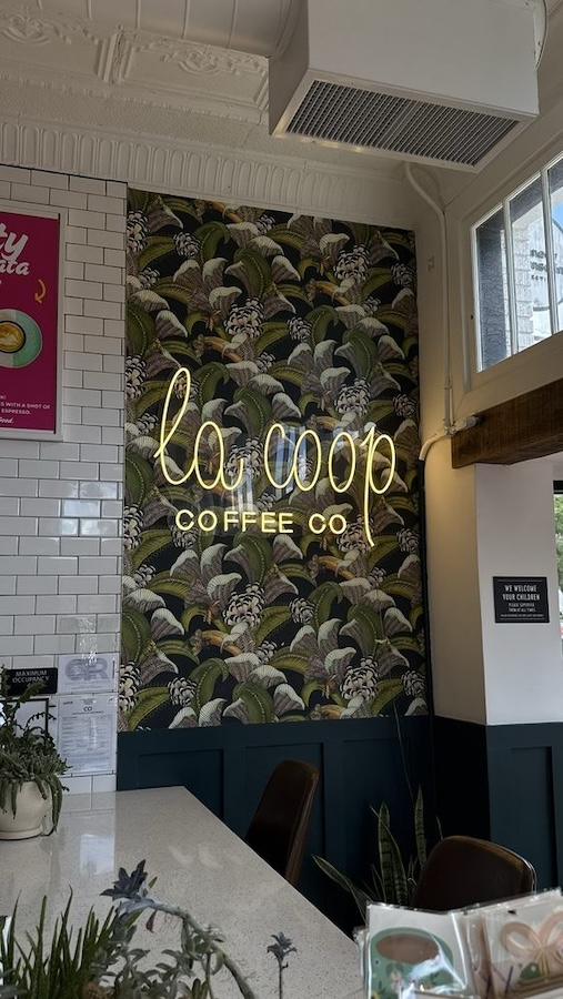 la coop coffee cafe neon sign in Washington